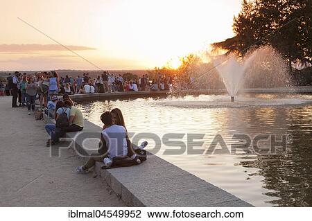 People enjoying the sunset at Debod Temple (Templo de Debod), Parque del Oeste, Madrid, Spain, Europe View Large Photo Image Stock Image - People enjoying the sunset at Debod Temple (Templo de Debod), Parque del Oeste, Madrid, Spain, Europe. Fotosearch