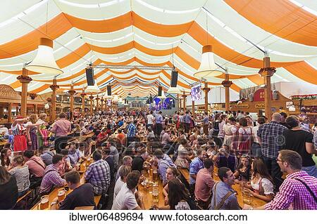 Picture - People in a beer tent at the Cannstatter Volksfest, Cannstatter Wasen, Bad Cannstatt, Stuttgart, Baden-Württemberg, Germany, Europe. Fotosearch