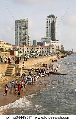 People on small sandy beach at Galle Face Green, Colombo, Sri Lanka, Asia View Large Photo Image Picture - People on small sandy beach at Galle Face Green, Colombo, Sri Lanka, Asia. Fotosearch