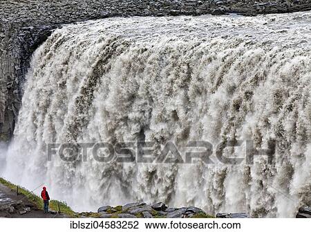 Person at the waterfall Dettifoss, river Jökulsá á Fjöllum, Northern Iceland, Iceland, Europe View Large Photo Image Stock Image - Person at the waterfall Dettifoss, river Jökulsá á Fjöllum, Northern Iceland, Iceland, Europe. Fotosearch