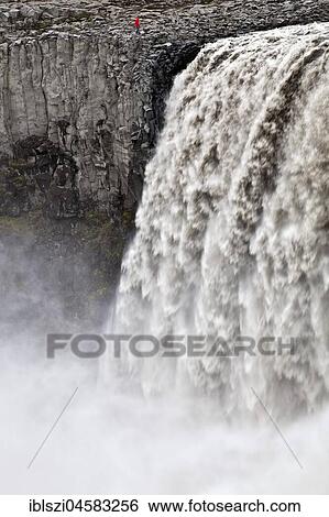 Person at the waterfall Dettifoss, river Jökulsá á Fjöllum, Northern Iceland, Iceland, Europe View Large Photo Image Stock Photograph - Person at the waterfall Dettifoss, river Jökulsá á Fjöllum, Northern Iceland, Iceland, Europe. Fotosearch