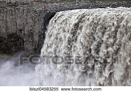 Person at the waterfall Dettifoss, river Jökulsá á Fjöllum, Northern Iceland, Iceland, Europe View Large Photo Image Stock Photography - Person at the waterfall Dettifoss, river Jökulsá á Fjöllum, Northern Iceland, Iceland, Europe. Fotosearch
