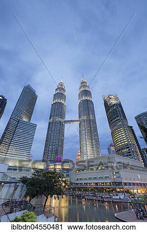 Stock Image - Petronas twin towers at dusk, Kuala Lumpur, Malaysia, Asia. Fotosearch