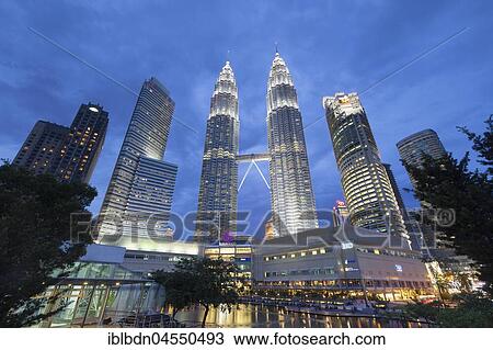 Stock Image - Petronas twin towers at dusk, Kuala Lumpur, Malaysia, Asia. Fotosearch