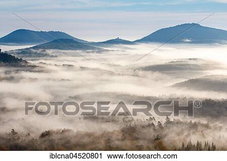 Stock Image - Pfälzer Wald, Fog, Sunrise, Palatinate, Rhineland-Palatinate, Germany, Europe. Fotosearch