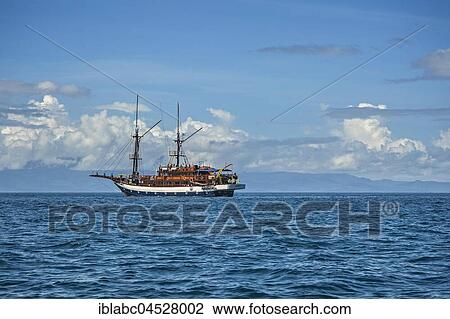 Phinisi Sailboat, Raja-Ampat, Kri Island, Dampier Strait, West Papua, Western New Guinea, Indonesia, Asia View Large Photo Image Stock Image - Phinisi Sailboat, Raja-Ampat, Kri Island, Dampier Strait, West Papua, Western New Guinea, Indonesia, Asia. Fotosearch