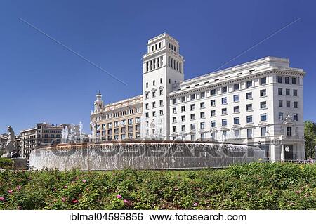 Stock Photograph - Placa de Catalunya with fountain, Bank building Banco Espanol de Credito, Barcelona, Catalonia, Spain, Europe. Fotosearch