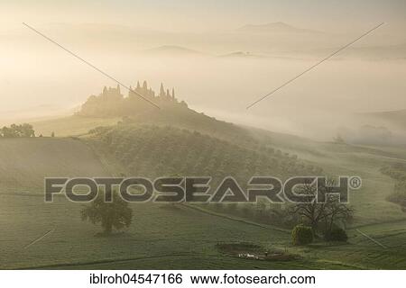 Podere Belvedere, single homestead at sunrise in mist, San Quirico d'Orcia, Val d'Orcia, Tuscany, Italy, Europe View Large Photo Image Stock Photograph - Podere Belvedere, single homestead at sunrise in mist, San Quirico d'Orcia, Val d'Orcia, Tuscany, Italy, Europe. Fotosearch