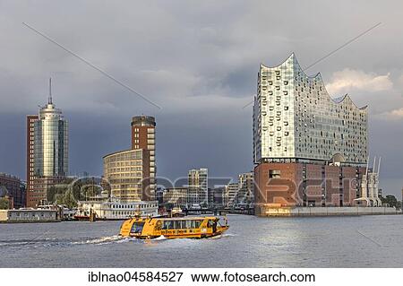 Port of Hamburg, northern bank of the Elbe River with Elbphilharmonie, Elbe Philharmonic Hall, Hanseatic Trade Center and office buildings, Kehrwiederspitze, HafenCity, Hamburg, Germany, Europe View Large Photo Image Stock Photo - Port of Hamburg, northern bank of the Elbe River with Elbphilharmonie, Elbe Philharmonic Hall, Hanseatic Trade Center and office buildings, Kehrwiederspitze, HafenCity, Hamburg, Germany, Europe. Fotosearch