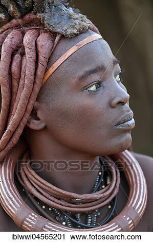 Stock Image - Portrait of a young, married Himbafrau, Kaokoveld, Kunene, Namibia, Africa. Fotosearch