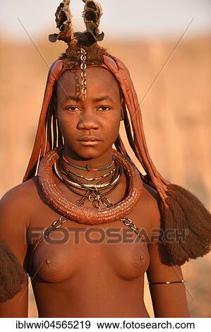 Stock Photo - Portrait of a young, married Himbafrau, Kaokoveld, Kunene, Namibia, Africa. Fotosearch