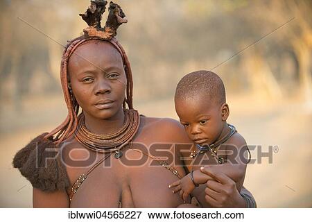 Portrait of a young woman with child, Kaokoveld, Kunene, Namibia, Africa View Large Photo Image Stock Photo - Portrait of a young woman with child, Kaokoveld, Kunene, Namibia, Africa. Fotosearch