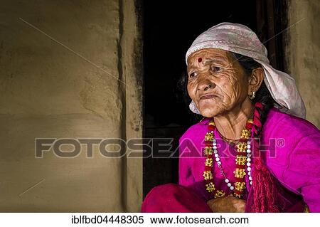 Portrait, old, wrinkled native woman, wearing pink shirt, Ghandruk, Kaski District, Nepal, Asia View Large Photo Image Stock Photography - Portrait, old, wrinkled native woman, wearing pink shirt, Ghandruk, Kaski District, Nepal, Asia. Fotosearch
