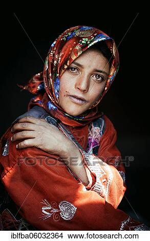 Portrait Sadaf Ma, child of a Wakhi family with traditional traditional traditional traditional traditional traditional traditional traditional traditional traditional costume of red cloth, who live as farmers and shepherds in Saradh-e-Broghil, Wakhan... View Large Photo Image Picture - Portrait Sadaf Ma, child of a Wakhi family with traditional traditional traditional traditional traditional traditional traditional traditional traditional traditional costume of red cloth, who live as farmers and shepherds in Saradh-e-Broghil, Wakhan.... Fotosearch