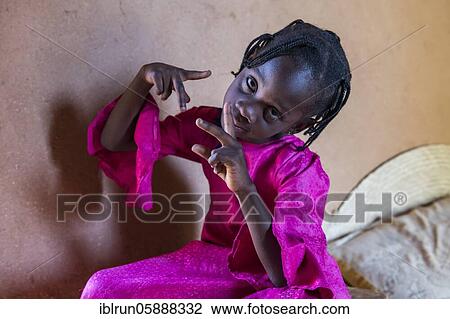 Stock Image - Posing young girl, Agadez, Niger, Africa. Fotosearch