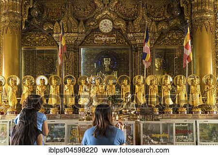 Praying Buddhists in the Sule Pagoda, Rangoon, Myanmar, Asia View Large Photo Image Stock Image - Praying Buddhists in the Sule Pagoda, Rangoon, Myanmar, Asia. Fotosearch