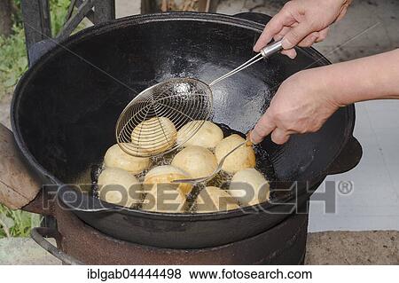 Preparation of local tandyr bread, Kazakh ethnographic village aul Gunny, Talgar city, Almaty, Kazakhstan, Asia View Large Photo Image Stock Photo - Preparation of local tandyr bread, Kazakh ethnographic village aul Gunny, Talgar city, Almaty, Kazakhstan, Asia. Fotosearch