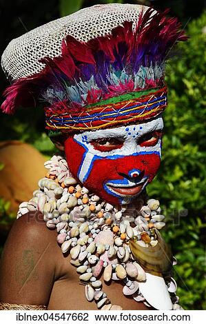 Stock Image - Preparation of the highland tribes, War Kang group, for the big yearly Sing Sing of Goroka, Goroka, Papua New Guinea, Oceania. Fotosearch