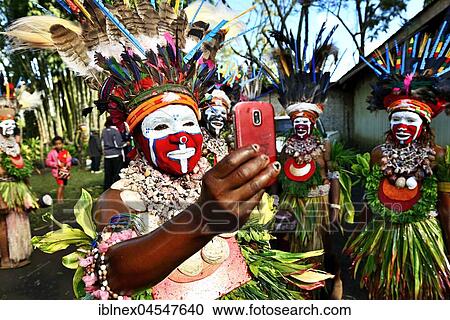 Stock Image - Preparations of the highland tribes, War Kang group, for the big Sing-Sing of Goroka, Goroka, Papua New Guinea, Oceania. Fotosearch