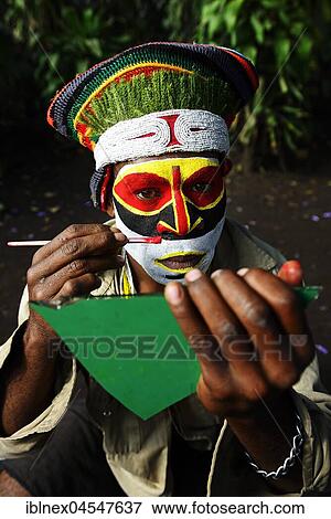 Stock Photo - Preparations of the highland tribes, Hooks Ambe, for the big Sing-Sing Festival, Goroka, Papua New Guinea, Oceania. Fotosearch