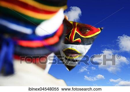 Stock Photography - Preparing of the highland tribes, Hooks Ambe group, for the great yearly sing-sing of Goroka, Goroka, Papua New Guinea, Oceania. Fotosearch