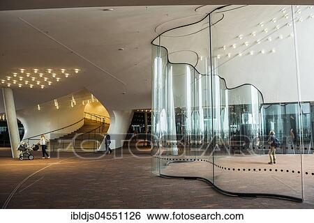 Public viewing platform, Plaza with wind deflector made of curved glass, Elbe Philharmonic Hall, architects Herzog & De Meuron, Hafencity, Hamburg, Germany, Europe View Large Photo Image Stock Photograph - Public viewing platform, Plaza with wind deflector made of curved glass, Elbe Philharmonic Hall, architects Herzog & De Meuron, Hafencity, Hamburg, Germany, Europe. Fotosearch