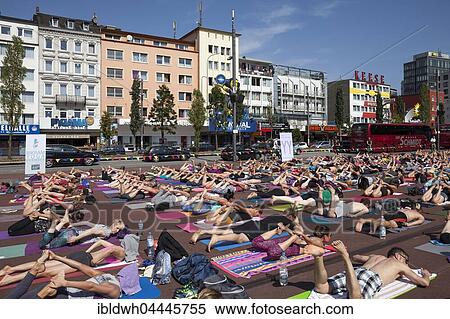 Public yoga on The Reeperbahn, St. Pauli, Hamburg, Germany, Europe View Large Photo Image Stock Photography - Public yoga on The Reeperbahn, St. Pauli, Hamburg, Germany, Europe. Fotosearch