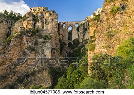 Puente Nuevo with Tajo gorge, Ronda, Malaga province, Andalusia, Spain, Europe View Large Photo Image Stock Photograph - Puente Nuevo with Tajo gorge, Ronda, Malaga province, Andalusia, Spain, Europe. Fotosearch