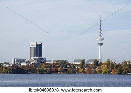 Radisson Blu Hotel and TV tower, at the Außenalster in autumn, Hamburg, Germany, Europe View Large Photo Image Stock Photo - Radisson Blu Hotel and TV tower, at the Außenalster in autumn, Hamburg, Germany, Europe. Fotosearch