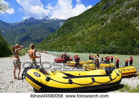 Stock Photo - Rafting boats on the shore of river Soca, Bovec, Slovenia, Europe. Fotosearch