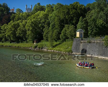 Stock Photography - Rafting on the river Isar, at back Church of the Holy Cross, Bad Tölz, Bavaria, Germany, Europe. Fotosearch