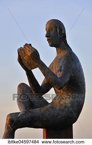 Reading, bronze sculpture by Karl Ulrich Nuss, Sculpture Trail Strümpfelbach, Remstal, Baden-Württemberg, Germany, Europe View Large Photo Image Picture - Reading, bronze sculpture by Karl Ulrich Nuss, Sculpture Trail Strümpfelbach, Remstal, Baden-Württemberg, Germany, Europe. Fotosearch