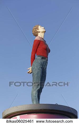 Realistic female figure on an advertising pillar, column saint Marlis, sculpture by Christoph Pöggeler, Media Harbour Düsseldorf, North Rhine-Westphalia, Germany, Europe View Large Photo Image Stock Image - Realistic female figure on an advertising pillar, column saint Marlis, sculpture by Christoph Pöggeler, Media Harbour Düsseldorf, North Rhine-Westphalia, Germany, Europe. Fotosearch
