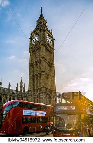 Stock Image - Red double decker bus in front of Big Ben, Houses of Parliament, backlit, evening light, City of Westminster, London, London region, England, United Kingdom, Europe. Fotosearch