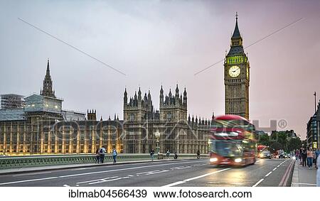 Red double-decker bus on the Westminster Bridge, evening twilight, Palace of Westminster and Big Ben, motion blur, London, England, Great Britain View Large Photo Image Stock Photo - Red double-decker bus on the Westminster Bridge, evening twilight, Palace of Westminster and Big Ben, motion blur, London, England, Great Britain. Fotosearch