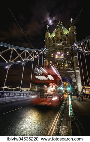 Red double-decker bus on the Tower Bridge, night shot, Southwark, London, England, United Kingdom, Europe View Large Photo Image Stock Image - Red double-decker bus on the Tower Bridge, night shot, Southwark, London, England, United Kingdom, Europe. Fotosearch