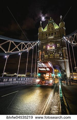 Red double-decker bus on the Tower Bridge, night shot, Southwark, London, England, United Kingdom, Europe View Large Photo Image Stock Photo - Red double-decker bus on the Tower Bridge, night shot, Southwark, London, England, United Kingdom, Europe. Fotosearch