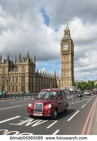 Stock Photo - Red Taxi on the Westminster Bridge, Westminster Palace and Big Ben, London, England, Great Britain. Fotosearch