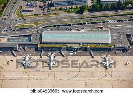 Regional airport Dortmund-Wickede, apron with passenger aircraft, flight terminal, Terminal 1, aerial photo, Dortmund, Ruhr area, North Rhine-Westphalia, Germany, Europe View Large Photo Image Stock Photography - Regional airport Dortmund-Wickede, apron with passenger aircraft, flight terminal, Terminal 1, aerial photo, Dortmund, Ruhr area, North Rhine-Westphalia, Germany, Europe. Fotosearch