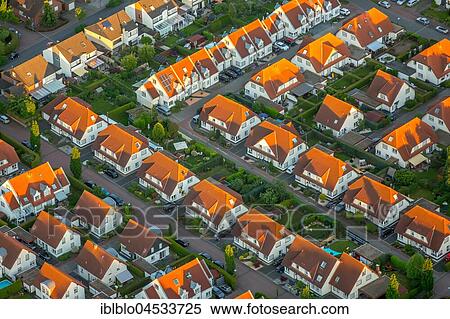 Stock Photography - Residential area Weidenweg, semi-detached houses, estate of terraced houses, residential property, red tile roofs, Bergkamen, Ruhr area, North Rhine-Westphalia, Germany, Europe. Fotosearch