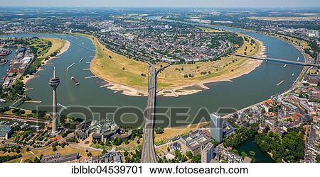 Rheinbogen near Oberkassel, Niederkassel, television tower Rheinkniebrücke, aerial photo, Düsseldorf, Rhineland, North Rhine-Westphalia, Germany, Europe View Large Photo Image Stock Image - Rheinbogen near Oberkassel, Niederkassel, television tower Rheinkniebrücke, aerial photo, Düsseldorf, Rhineland, North Rhine-Westphalia, Germany, Europe. Fotosearch