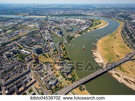 Rheinbogen near Oberkassel, Niederkassel, television tower Rheinkniebrücke, aerial photo, Düsseldorf, Rhineland, North Rhine-Westphalia, Germany, Europe View Large Photo Image Stock Image - Rheinbogen near Oberkassel, Niederkassel, television tower Rheinkniebrücke, aerial photo, Düsseldorf, Rhineland, North Rhine-Westphalia, Germany, Europe. Fotosearch