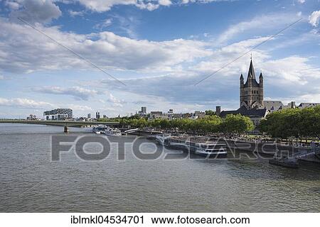 Rhine promenade with church Groß St. Martin, Cologne, North Rhine-Westphalia, Germany, Europe View Large Photo Image Stock Image - Rhine promenade with church Groß St. Martin, Cologne, North Rhine-Westphalia, Germany, Europe. Fotosearch