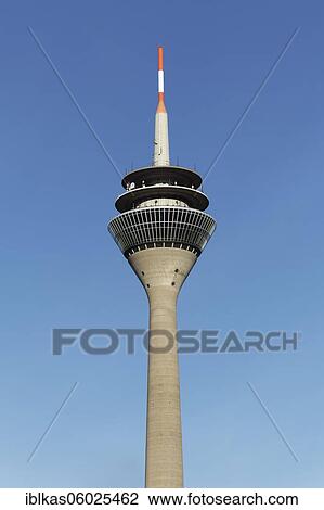 Rhine tower in front of a blue sky, television tower, media harbour Düsseldorf, North Rhine-Westphalia, Germany, Europe View Large Photo Image Stock Image - Rhine tower in front of a blue sky, television tower, media harbour Düsseldorf, North Rhine-Westphalia, Germany, Europe. Fotosearch
