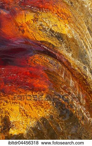 Rio Tinto, Red river, detail with oxidised iron minerals in water, Huelva province, Andalusia, Spain, Europe View Large Photo Image Stock Photo - Rio Tinto, Red river, detail with oxidised iron minerals in water, Huelva province, Andalusia, Spain, Europe. Fotosearch
