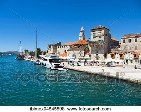 Riva Promenade and Palazzo, Old Town Trogir, UNESCO World Cultural Heritage, Split region, Middle Dalmatia, Dalmatia, Adriatic coast, Croatia, Europe View Large Photo Image Stock Photo - Riva Promenade and Palazzo, Old Town Trogir, UNESCO World Cultural Heritage, Split region, Middle Dalmatia, Dalmatia, Adriatic coast, Croatia, Europe. Fotosearch
