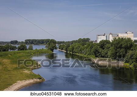 Stock Photo - River Lippe, Lipper river mouth into the river Rhine, recultivated wetland area, Wesel, Lower Rhine, North Rhine-Westphalia, Germany, Europe. Fotosearch