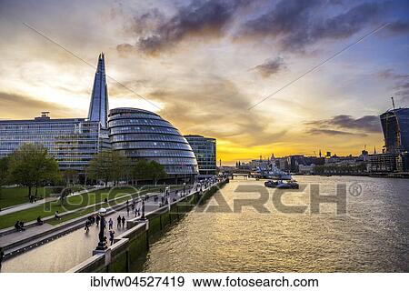 Riverside promenade on the Thames, Potters Fields Park, Skyline, London City Hall, The Shard, at sunset, Southwark, London, England, United Kingdom, Europe View Large Photo Image Stock Photo - Riverside promenade on the Thames, Potters Fields Park, Skyline, London City Hall, The Shard, at sunset, Southwark, London, England, United Kingdom, Europe. Fotosearch