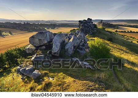 Stock Image - Rock formation, nature reserve Teufelsmauer, morning light, near Weddersleben, Harz, Saxony-Anhalt, Germany, Europe. Fotosearch