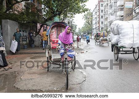 Rojina Begum, disabled rickshaw driver, Elephant Road, Dhaka, Bangladesh, Asia View Large Photo Image Stock Photograph - Rojina Begum, disabled rickshaw driver, Elephant Road, Dhaka, Bangladesh, Asia. Fotosearch